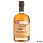 Cedar Ridge Rye Whiskey 700ml  Cedar Ridge Rye Whiskey is an exceptional expression, showcasing the bold and spicy character of rye grain. Crafted from a mash bill of 70% rye, 20% corn, and 10% malted barley, this whiskey is distilled and aged in charred American oak barrels, allowing it to develop a rich and smooth profile. The result is a well-balanced whiskey that is perfect for sipping neat or mixing into classic cocktails. With its distinctive flavors and high-quality craftsmanship, Cedar Ridge Rye embodies the spirit of Iowa distilling.  Brand: Cedar Ridge Type: Rye Whiskey Volume: 700ml ABV: 43% Origin: USA   Tasting Notes:  Nose: Inviting aromas of spicy rye, caramel, and oak, accompanied by hints of vanilla and dried fruit. Palate: A rich and full-bodied experience with vibrant flavors of cracked pepper, cinnamon, and toffee, balanced by a touch of sweetness and creamy vanilla. Finish: A long, warming finish with lingering spice and sweetness, leaving a delightful aftertaste.  Key Features:  High Rye Content: At 70% rye in the mash bill, this whiskey offers a robust and spicy character. Crafted Locally: Cedar Ridge uses locally sourced ingredients to create an authentic whiskey experience that reflects Iowa’s distilling heritage. Versatile: Ideal for sipping neat, on the rocks, or as a flavorful base in cocktails like the Manhattan or Old Fashioned.  Other reviews… Sharp, even a bit of a sour edge, and some stemmy grass. Sweet and chewy grain in the mouth, with a nice touch of oily rye bitterness, some hot oak that quirks the tongue a bit, then a finish that melts into creaminess. 85 points – whiskyadvocate.com, reviewed by: Lew Bryson 2015  …Nose: Lots of corn, grain, and new oak. There’s a tingling of ethanol that makes its presence known, but not enough to be to unpleasant. While this is aged for a minimum of four years, it comes off as a whiskey that hasn’t spent a ton of time in the barrel due to the lack of depth displayed in its weak nose.  Palate. Corn, light vanilla, fruit jam, a hint of pear, and oak. The palate is more interesting than the nose, however all of the flavors present are very light and you really have to hunt them out. The ethanol that was clearly present in the nose isn’t present, and this bourbon ends up drinking lower than the 100 proof it clocks in at. Finish: White pepper, light fruits, vanilla, and fresh wood are all present at the start of the finish. These notes then fade away to just the white pepper and fresh wood, which linger for a short period. It’s simple, short, and leaves an unmemorable impression. – breakingbourbon.com  2016 San Francisco World Spirits Competition – GOLD